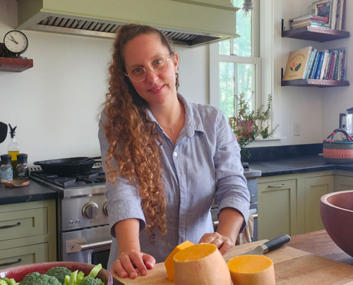 photo of Keren in a private Windham New York residence cooking vegetarian food